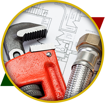 Pipe wrench and bolt over blueprints